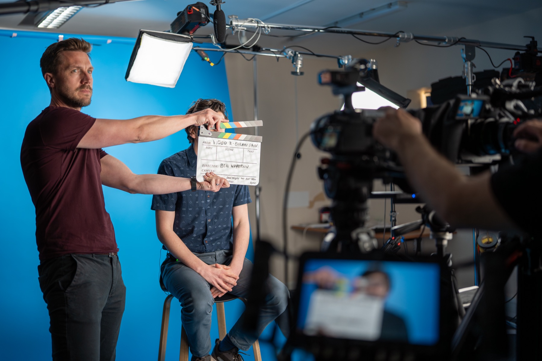 A clapperboard marking a take during an interview shoot