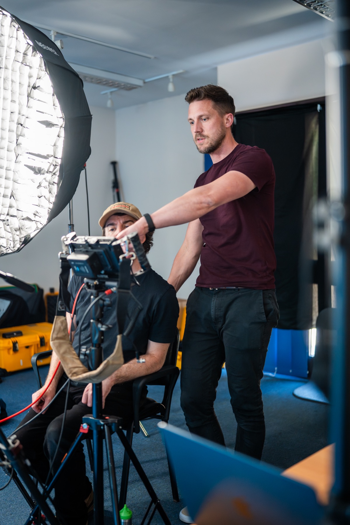 Lewis directing the camera setup during a production