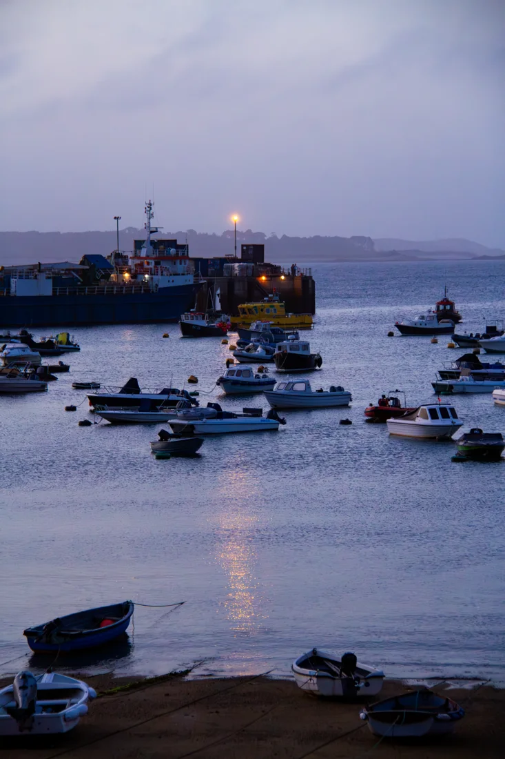Boats at dusk in a Scilly harbour