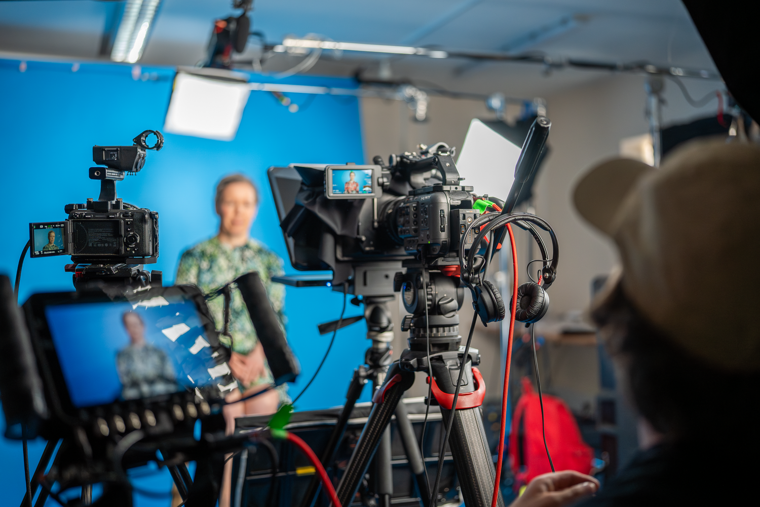 Cameras and lighting prepared for an interview-led studio production